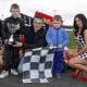Adam McFall receiving the final trophy from representatives of Cherry Pipes after winning all 3 races in the Ninja Karts at Tullyroan Oval on Sunday