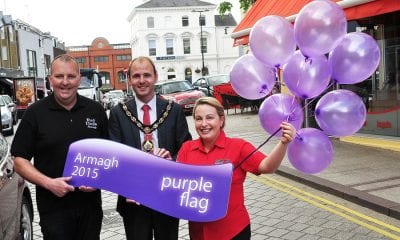 Celebrating the city’s latest success with Lord Mayor, Armagh City, Banbridge and Craigvon Borough Council, Darryn Causby, is Malachy O’Neill, Chair of Armagh City Centre Management and Teresa McGee, Manager of Rumour Espresso Bar.