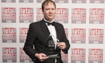 Gavin Emerson of Emersons Supermarket picking up the award in London