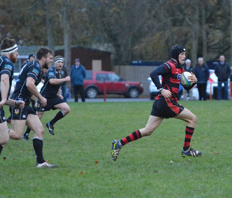 Armagh's Peter Elliot gets clear of the Ballymena forwards