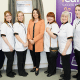 Mairead Mackle, centre, with members of the Homecare Independent Living care staff