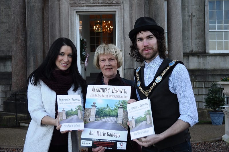 Lord Mayor of Armagh Garath Keating is joined by Cllr Sharon Haughey Grimley and local author Anne Gallogly to launch Anne's new book on dementia at The Palace Armagh