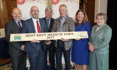 Winner in the Best Kept Medium Town Category of the NI Best Kept Awards is Armagh. Dave Foster, Department of Agriculture, Environment and Rural Affairs, Joe Mahon, Patron of the NI Amenity Council, Michelle Hatfield, Human Resources and Corporate Responsibility Director at Belfast City Airport and Doreen Muskett, President of the NI Amenity Council, present Armagh, Banbridge, Craigavon Council representative Barry Patience and Martin Kearns with their award. The judges noted that the strong historical connection of Armagh was beautifully realised by business people and residents who took pride in the town and its appearance.