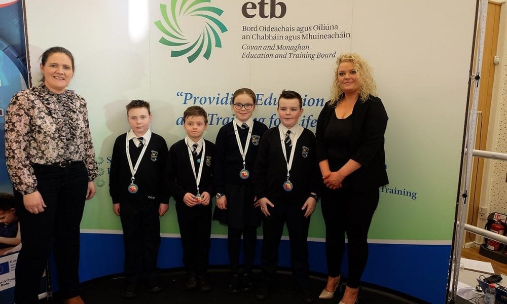 St Mary's Primary School Students receive their medals from Laura Brady Project Co ordinator CMETB