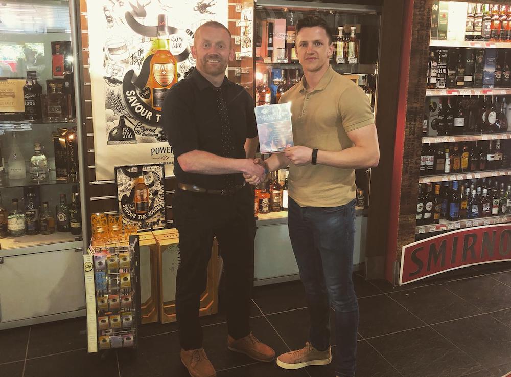 DrinkApp's operations manager James Freeman (right) and Adrian Cassidy, off-licence manager for Occasions, Centra in Keady
