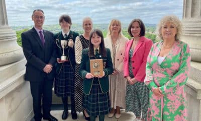 Pupils and staff from St Catherine's College, Armagh being presented with the Derrytrasna pastoral care award by the Permanent Secretary of the Department of Education, Dr Mark Browne and Director of Public Health, Public Health Agency Dr Joanne McClean