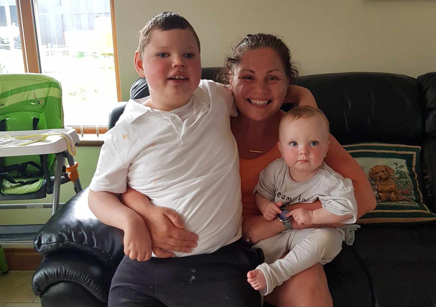 Paula Magee with her sons Cillian (left) and Cathal